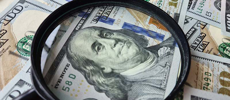 USD-Magnifying-Glass-TAX